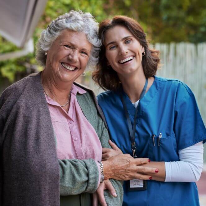 Caregiver Comforting Resident at Assisted Living Facility Caregiver Comforting Resident at Assisted Living Facility